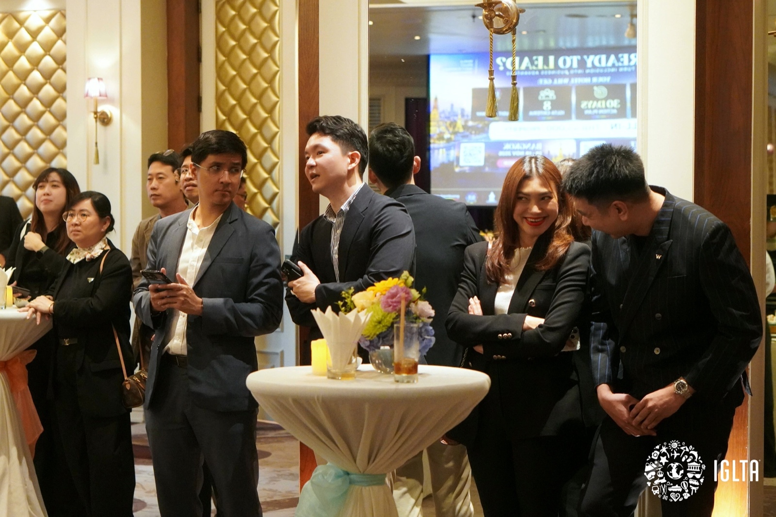 Guests in conversation during the networking reception